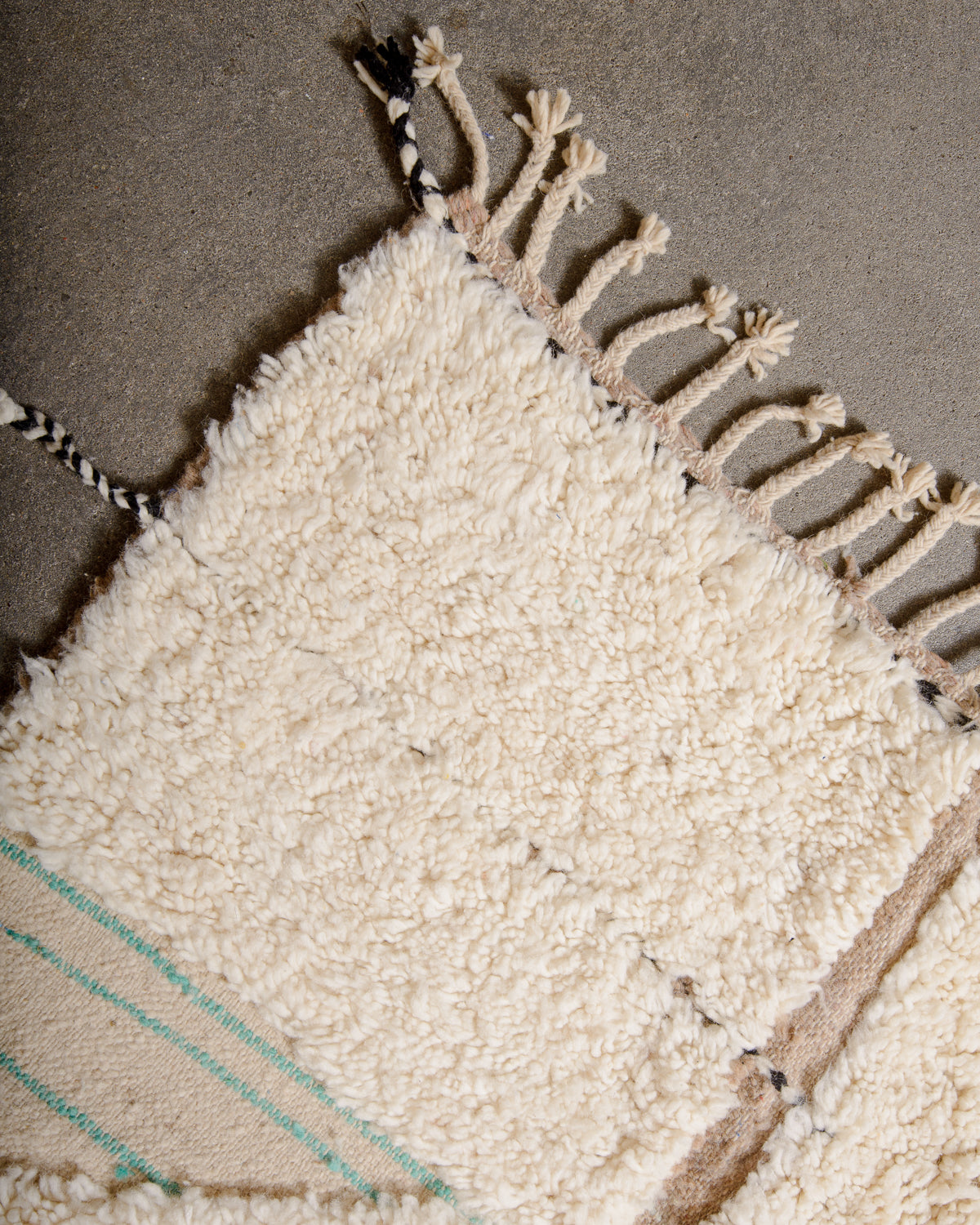 Modern, designer, handcrafted Berber rug from Morocco. Beniourain carpet with beautiful colours and patterns and fluffy wool texture.